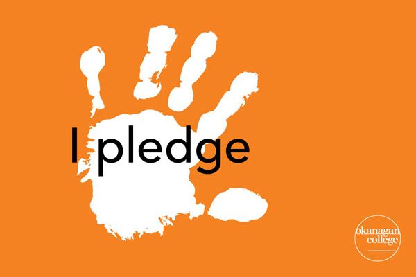 Handprint with the words "I pledge" over an orange background